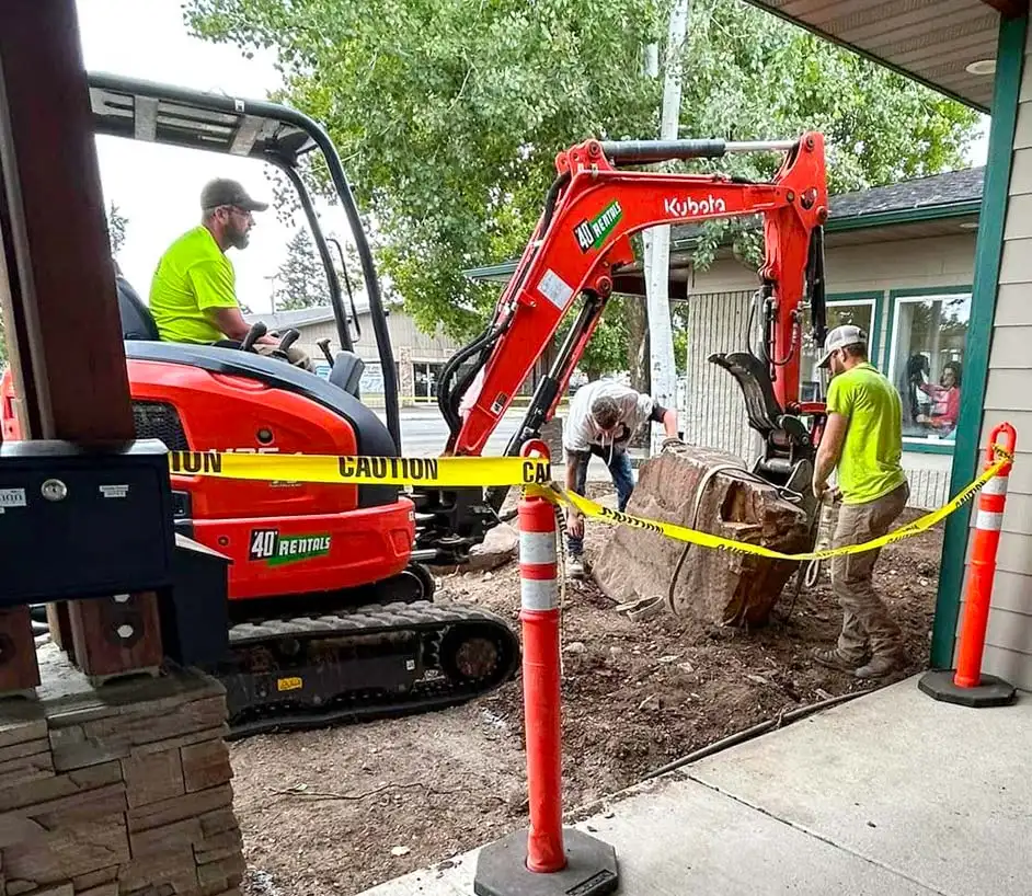 NIBCA-Adult-Education-Small-Image Excavator and men working on landscaping